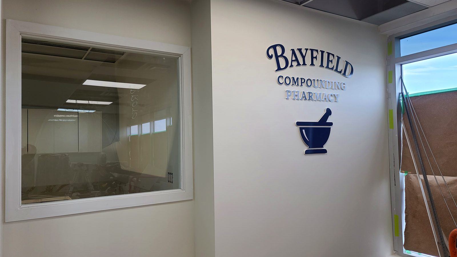 Bayfield Compounding Pharmacy — Signage and consult window