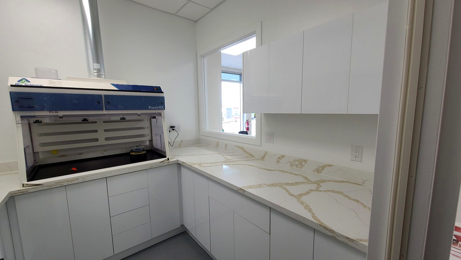 Compounding lab casework and containment hood installed to specification
