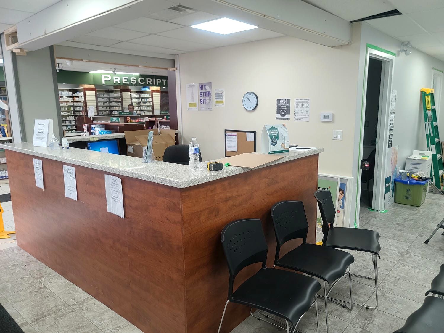 Completed medical centre reception desk in cherry and quartz