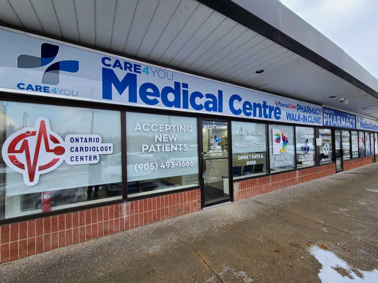 Completed medical centre and pharmacy storefront with signage